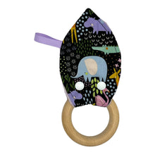 Load image into Gallery viewer, Baby Crinkle Teether by Mimi's Little Loveys. Fun and vibrant design, featuring crocodiles, elephants, flamingos, giraffes, hippos, tortoises, plants, and flowers, on a black background. Backing is dimple dot minky. Wooden teething ring.
