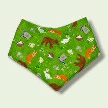 Load image into Gallery viewer, Baby bandana bib, with bears, foxes, hedgehogs, owls, raccoons, squirrels, on a green background.
