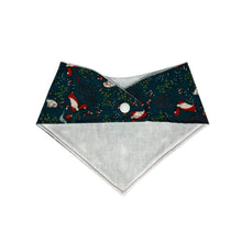Load image into Gallery viewer, Baby bandana bib with foxes, rabbits, and musrooms, on a green background.