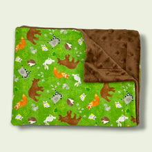 Load image into Gallery viewer, Kids blanket, with bears, foxes, hedgehogs, owls, raccoons, squirrels, on a green background.