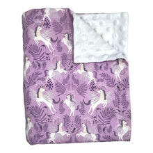 Load image into Gallery viewer, Purple blanket with unicorn pattern.