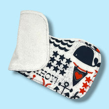 Load image into Gallery viewer, A pair of burpcloths, featuring a navy blue and red nautical design.