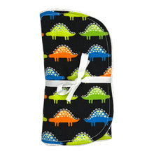 Load image into Gallery viewer, Folded burpcloth with colorful dinosaur pattern on a black background.