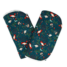 Load image into Gallery viewer, Folded burpcloth with foxes, rabbits, hedgehogs, and mushrooms, on a green background.