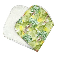Load image into Gallery viewer, Burpcloth set by Mimi's Little Loveys. Features cute foxes, raccoons, squirrels in a forest scene. Shades of browns, oranges, grays, and greens, on a yellow background. Backing is white terry cloth.