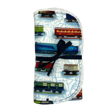 Load image into Gallery viewer, Folded burpcloth with steam trains and rolling stock design.