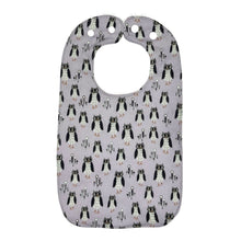 Load image into Gallery viewer, Baby bib with owl pattern on a light purple background.