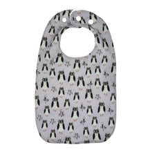 Load image into Gallery viewer, Baby bib with owl pattern on a light purple background.
