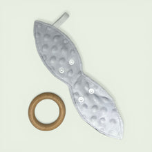 Load image into Gallery viewer, Teething ring with wooden ring and green fabric cover featuring rabbit designs
