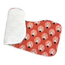 Load image into Gallery viewer, Folded burpcloth with fun zebra design on a coral pink background.