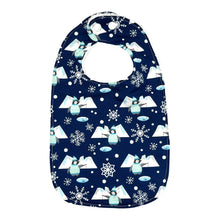 Load image into Gallery viewer, Baby bib with penguins fishing, icebergs, and snowflakes, on a blue background.