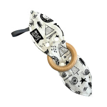 Load image into Gallery viewer, Teething ring with wooden ring and nature patterned fabric.