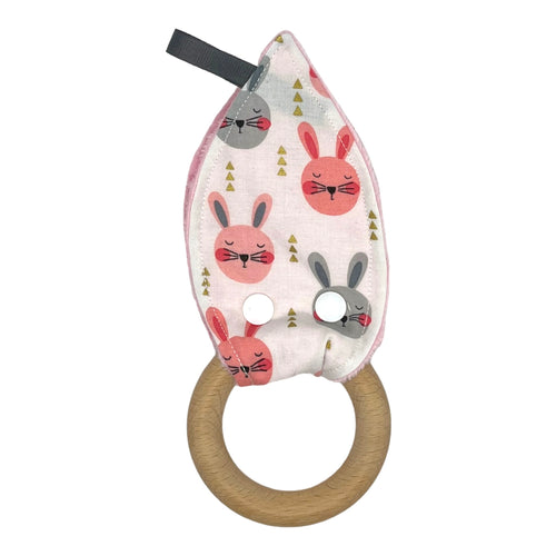 Baby Crinkle Teether by Mimi's Little Loveys. Fun pink & gray rabbits on a white background with metallic gold accents, and a wooden teething ring.