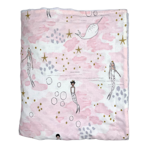Baby blanket by Mimi's Little Loveys. Whimsical mermaids & narwhals on a light pink background with metallic gold accents.