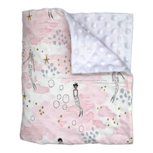Load image into Gallery viewer, Baby blanket by Mimi&#39;s Little Loveys. Whimsical mermaids &amp; narwhals on a light pink background with metallic gold accents.  Corner turned back to show soft, white, dimple minky backing.
