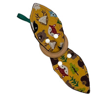 Load image into Gallery viewer, Baby Crinkle Teether by Mimi&#39;s Little Loveys. Fun and vibrant design, featuring group of Maine friends - bear, beaver, deer, fox, raccoon, and skunk - on a mustard yellow background. Backing is dimple dot minky. Wooden teething ring.
