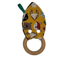 Load image into Gallery viewer, Baby Crinkle Teether by Mimi&#39;s Little Loveys. Fun and vibrant design, featuring group of Maine friends - bear, beaver, deer, fox, raccoon, and skunk - on a mustard yellow background. Backing is dimple dot minky. Wooden teething ring.
