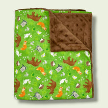 Load image into Gallery viewer, Kids blanket, with bears, foxes, hedgehogs, owls, raccoons, squirrels, on a green background.
