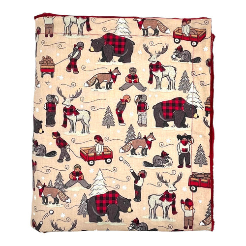 Baby and kids' blanket with bears, beavers, foxes, deer, and kids wearing buffalo plaid in winter.