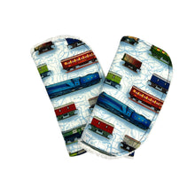 Load image into Gallery viewer, Folded burpcloth pair with steam trains and rolling stock design.

