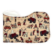 Load image into Gallery viewer, A burp cloth with a winter plaid pattern featuring bears, beavers, deer, and foxes in a snowy setting, and a terrycloth backing.
