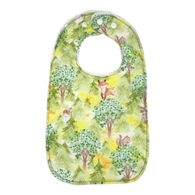 Load image into Gallery viewer, Everyday baby bib by Mimi's Little Loveys. Features cute foxes, raccoons, squirrels in a forest scene. Shades of browns, oranges, grays, and greens, on a yellow background. Backing is white terry cloth.
