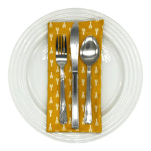 Load image into Gallery viewer, Yellow napkin with white lobster pattern, set on a white plate with cutlery.
