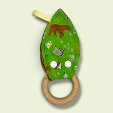 Load image into Gallery viewer, Teething toy with bears, foxes, hedgehogs, owls, raccoons, squirrels, on a green background.
