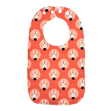 Load image into Gallery viewer, Baby bib with zebra pattern on a coral pink background.
