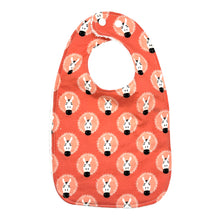 Load image into Gallery viewer, Baby bib with zebra pattern on a coral pink background.
