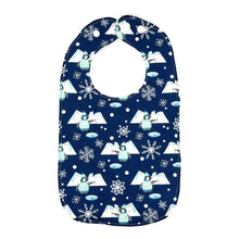 Load image into Gallery viewer, Baby bib with penguins fishing, icebergs, and snowflakes, on a blue background.
